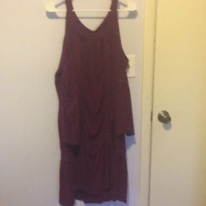 Maroon off the shoulder dress .